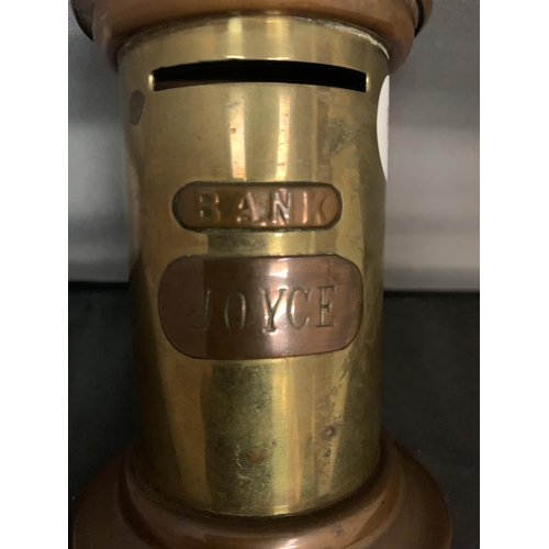 804 - A SMALL BRASS AND COPPER POST BOX MONEY BOX