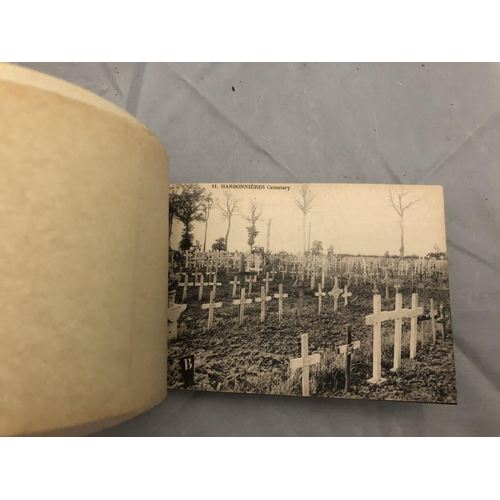 424 - A DETACHABLE BOOK OF POSTCARDS RELATING TO THE SOMME BRITISH CEMETERIES