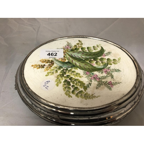 462 - A SILVER PLATED FRAMED CERAMIC PLATE OF WILD FLOWERS TEAPOT STAND