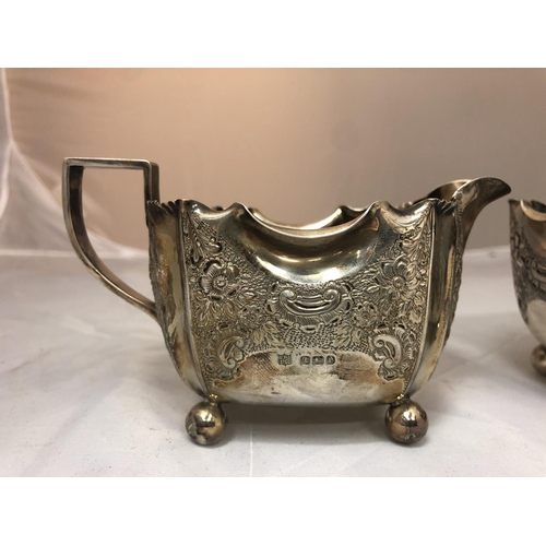 617 - A SILVER HALLMARKED MILK JUG 114G AND A SILVER HALLMARKED SUGAR BOWL 140G