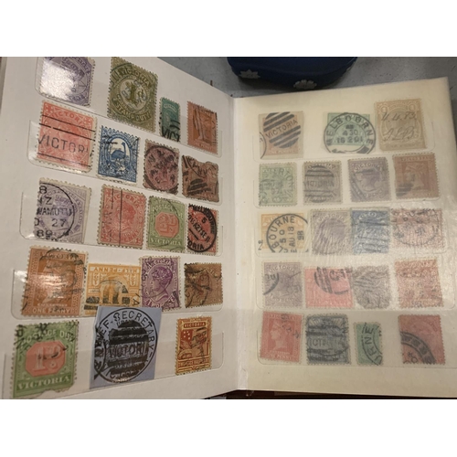 152 - AN ALBUM OF MIXED STAMPS