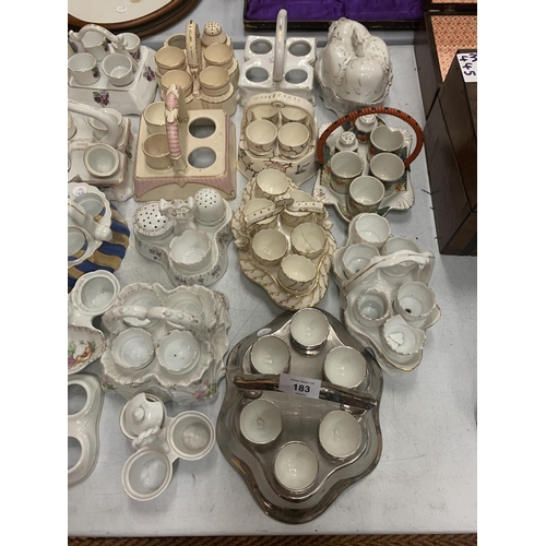 183 - A COLLECTION OF CERAMIC EGG CUPS AND HOLDERS (SEVERAL A/F)