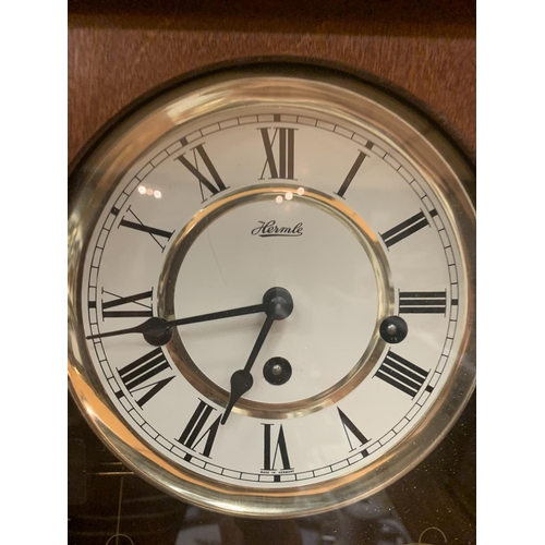 185 - A HERMLE VIENNA WALL CLOCK WITH KEY