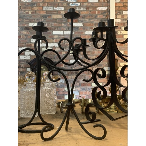 229 - A TRIO OF BLACK METAL CANDELABRA TO INCLUDE ONE SEVEN STEM