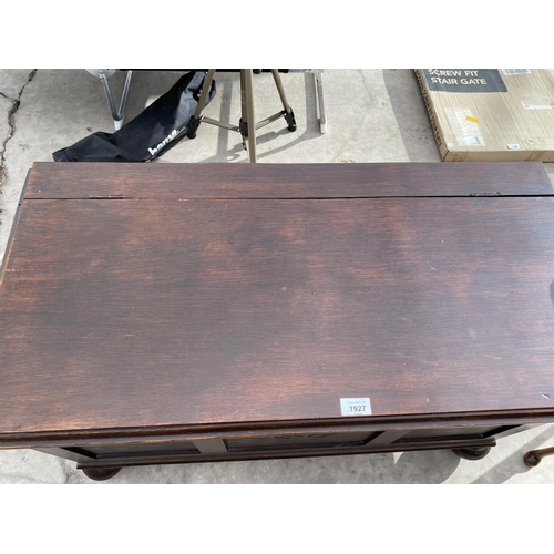 1927 - AN OAK BLANKET CHEST WITH PANELED FRONT