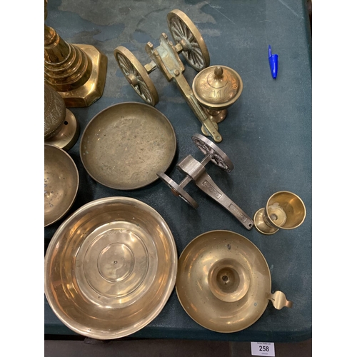 234 - AN ASSORTMENT OF BRASSWARE TO INCLUDE THREE LARGE CANDLE STICKS