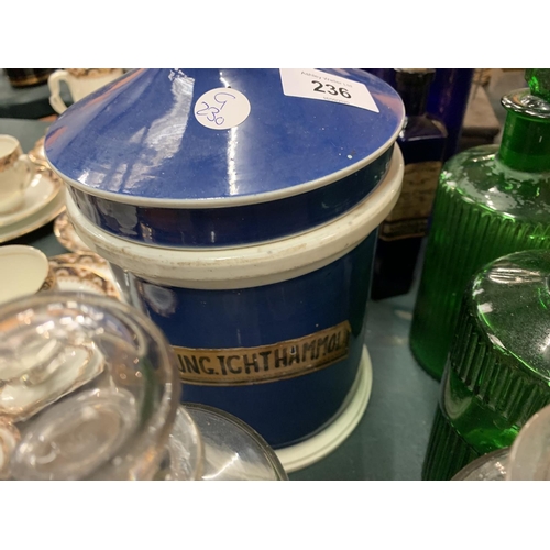 236 - A SELECTION OF GLASS AND CERAMIC CHEMIST JARS WITH NAMES TO INCLUDE A SET OF BOXED CHEMIST SCALES