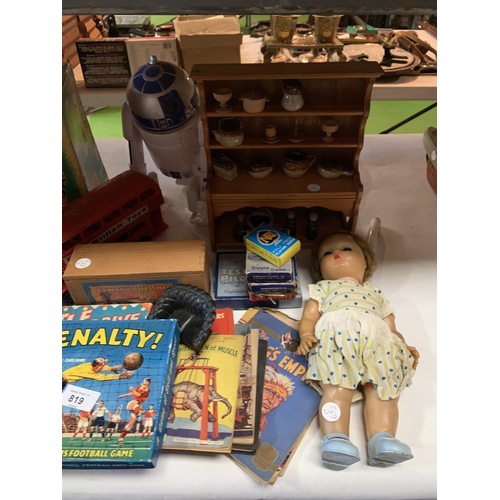 819 - A COLLECTION OF VINTAGE BOOKS AND GAMES TO INCLUDE DOLLS DRESSER, BATTERY OPERATED TEDDY ARTIST AND ... 