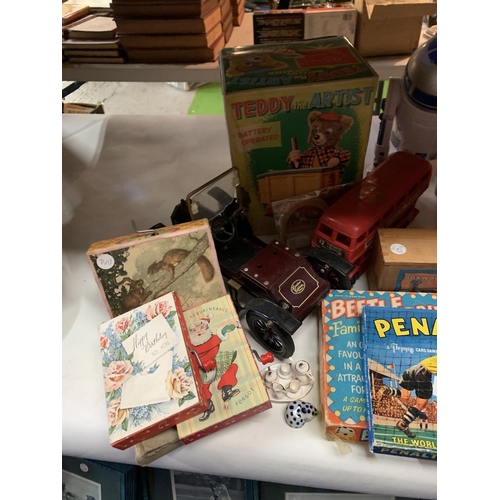 819 - A COLLECTION OF VINTAGE BOOKS AND GAMES TO INCLUDE DOLLS DRESSER, BATTERY OPERATED TEDDY ARTIST AND ... 