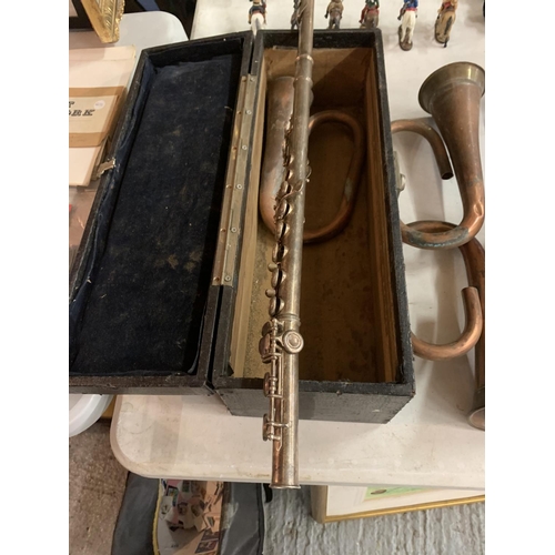 835 - A BUFFET FLUTE AND THREE BUGLE PARTS IN A WOODEN CASE