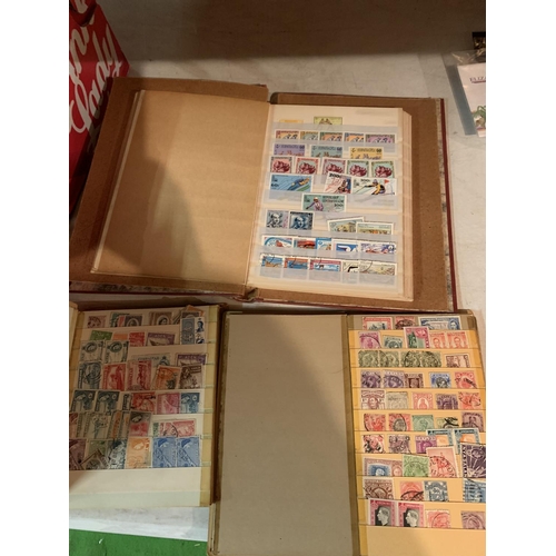 868 - THREE ALBUMS OF VARIOUS STAMPS