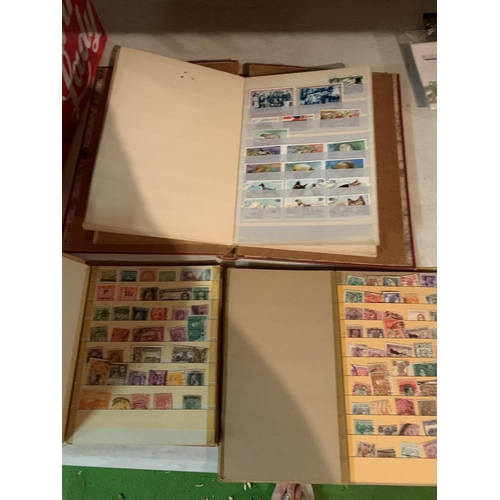 868 - THREE ALBUMS OF VARIOUS STAMPS