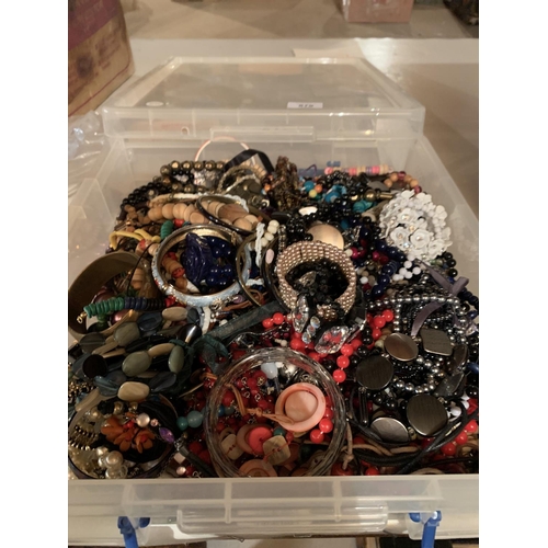 879 - A BOX CONTAINING A LARGE QUANTITY OF COSTUME JEWELLERY