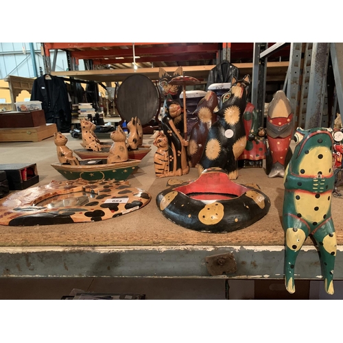 884 - A COLLECTION OF HAND CARVED AND PAINTED CATS ETC