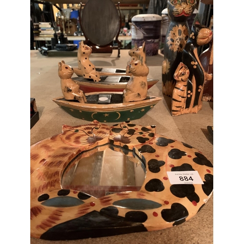 884 - A COLLECTION OF HAND CARVED AND PAINTED CATS ETC