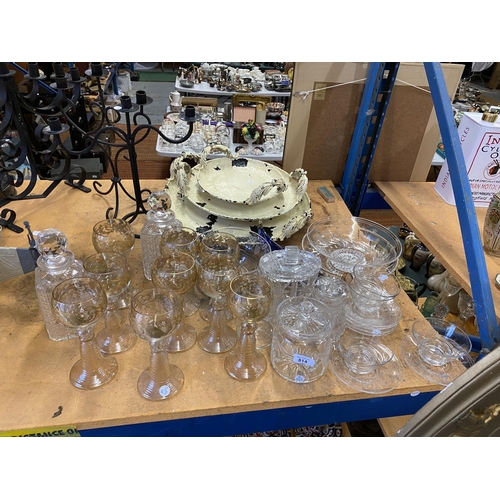 814 - A LARGE COLLECTION OF GLASS TO INCLUDE DECANTERS, GLASSES, LARGE BOWLS ETC