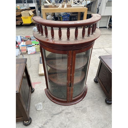 1928 - A MAHOGANY BOW FRONT DISPLAY CABINET WITH TWO GLAZED DOORS