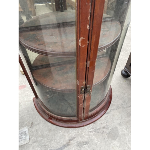 1928 - A MAHOGANY BOW FRONT DISPLAY CABINET WITH TWO GLAZED DOORS