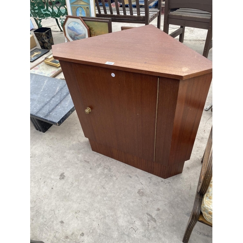 1935 - A TEAK CORNER CABINET