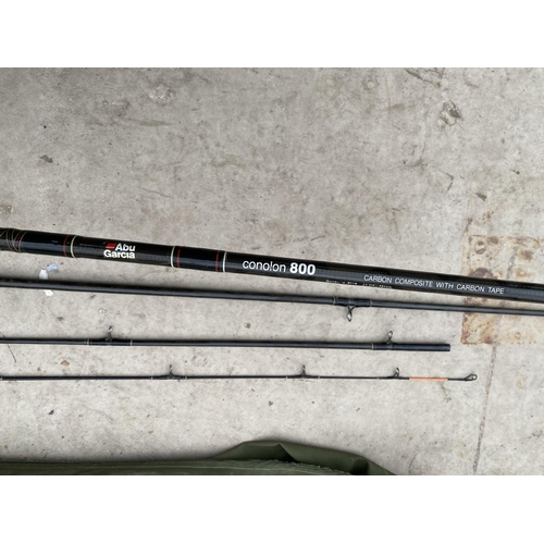 Lot - An Abu Garcia fishing rod Conolon 800, with Sealine SL 17 5H reel,  plus two other rods with lures, flies, lines, wicker case etc.