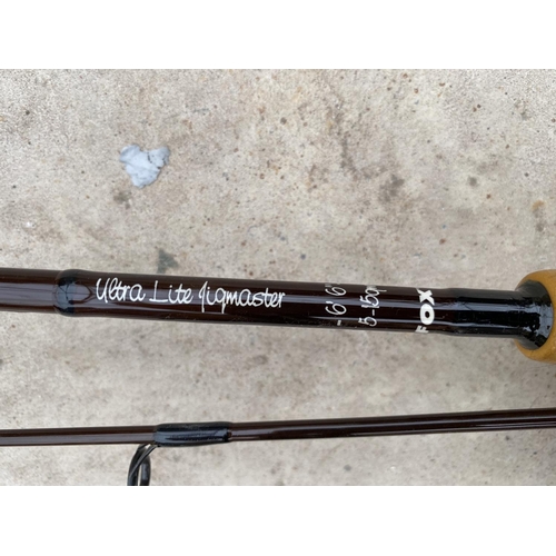 A FOX ULTRA LITE JIGMASTER TWO PIECE FISHING ROD AND ROD BAG