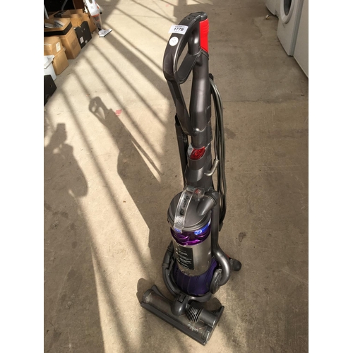 A DYSON DC25 ROLLERBALL VACUUM CLEANER BELIEVED WORKING BUT NO WARRANTY