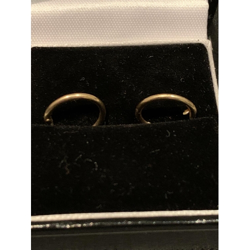 527 - A BOXED  PAIR OF 9 CARAT GOLD SLEEPER EARRINGS