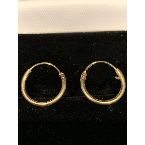 527 - A BOXED  PAIR OF 9 CARAT GOLD SLEEPER EARRINGS