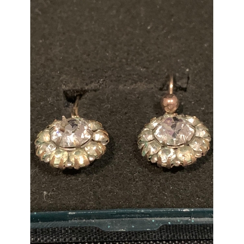 529 - A PAIR OF YELLOW METAL (POSSIBLY GOLD) DIAMANTE EARRINGS