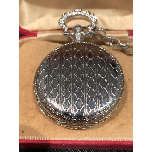 545 - A WHITE METAL POCKET WATCH WITH CHAIN