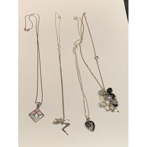 548 - FOUR VARIOUS SILVER NECKLACES