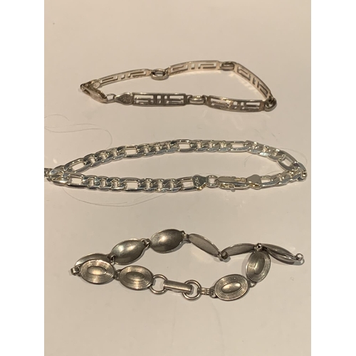 552 - THREE SILVER BRACELETS