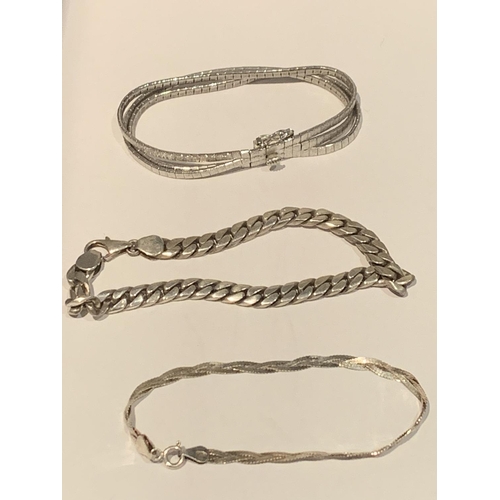 555 - THREE SILVER BRACELETS