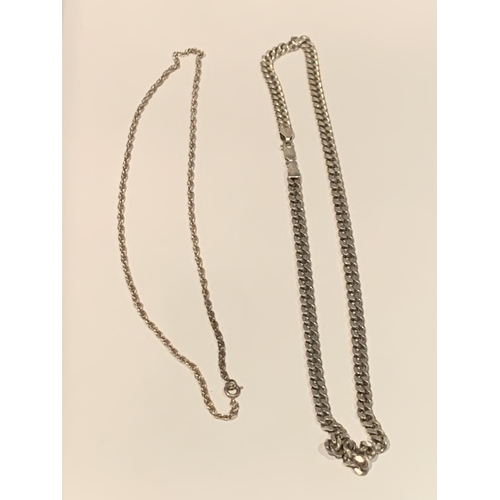 556 - TWO SILVER NECKLACES