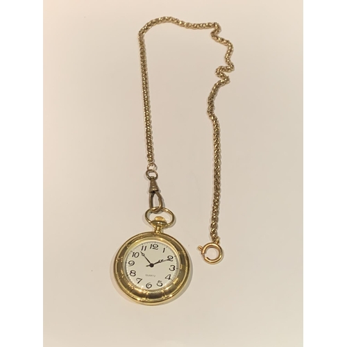 559 - A YELLOW METAL POCKET WATCH AND CHAIN