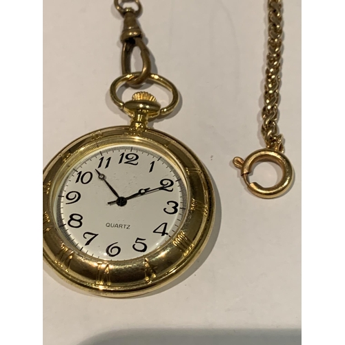 559 - A YELLOW METAL POCKET WATCH AND CHAIN