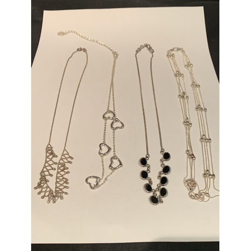 563 - FOUR VARIOUS SILVER NECKLACES