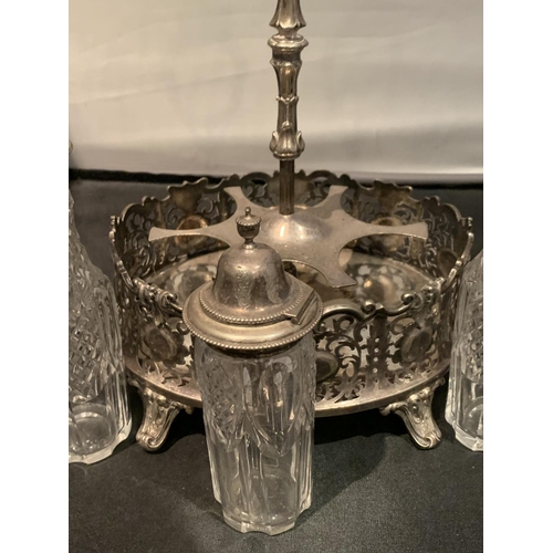 566 - A SILVER PLATED CRUET SET ON A STAND