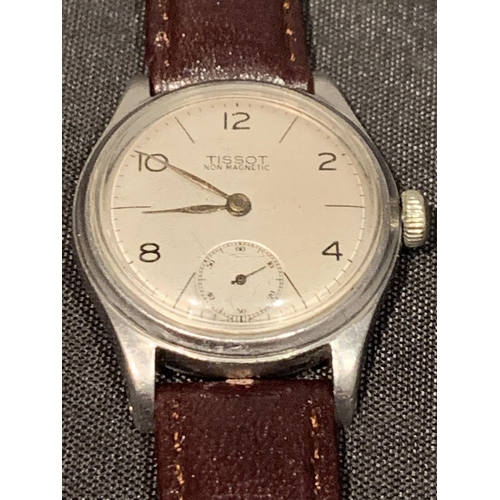 570 - A GENTS TISSOT 1945 WW2 MILITARY WATCH