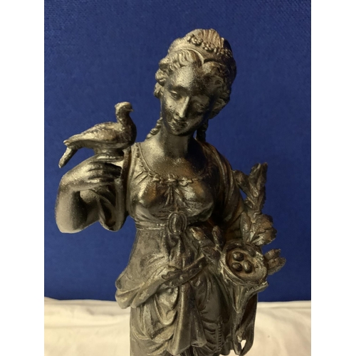 15 - A PAIR OF SPELTER FIGURINES ON POLISHED WOODEN BASES