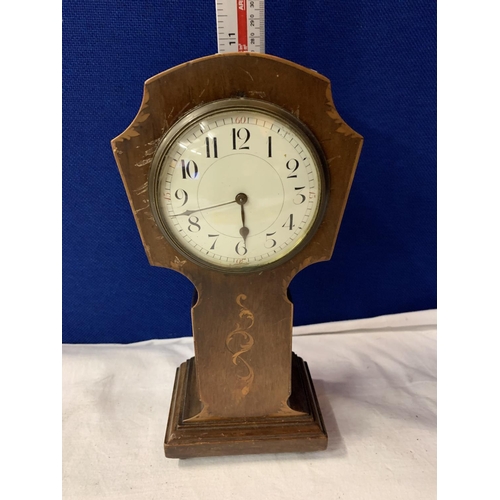 21 - A TALL VINTAGE WOODEN MANTLE CLOCK