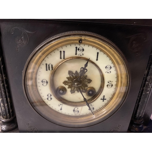 26 - A VINTAGE POLISHED SLATE AND MARBLE MANTLE CLOCK