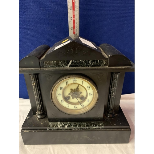 26 - A VINTAGE POLISHED SLATE AND MARBLE MANTLE CLOCK