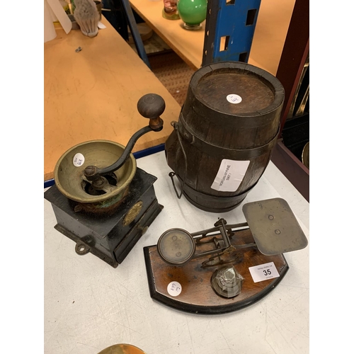 35 - A TRIO OF VINTAGE WOODEN AND BRASS WARETO INCLUDE A BRANDY BARREL AND COFFEE GRINDER