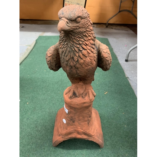 36 - A TERRACOTTA BIRD OF PREY ROOF FINIAL