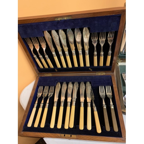 46 - TWO WOODEN PRESENTATION BOXES CONTAINING A QUANTITY OF SILVER PLATED FLATWARE