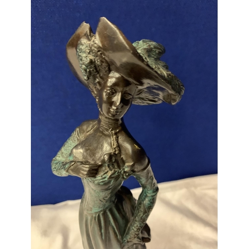 48 - A BRONZE FIGURINE AN OF EDWARDIAN LADY WITH HER DOG