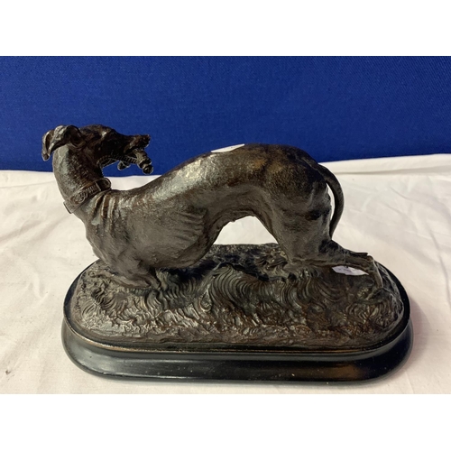 8 - A SPELTER ORNAMENT OF A HUNTING DOG ON A WOODEN PLINTH