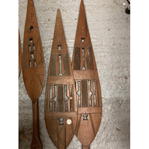 101 - FOUR CARVED SOUTH SEA ISLANDS WOODEN PADDLES ( ONE A/F)