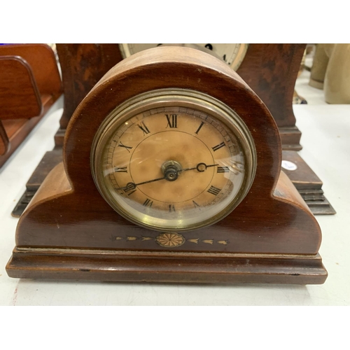 114 - THREE WOODEN MANTLE CLOCKS AND A WOODEN BAROMETER